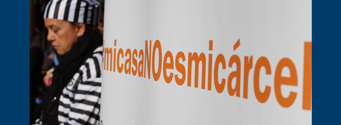 fotografía pancarta de #Arrestópolis, micasaNOesmicárcel