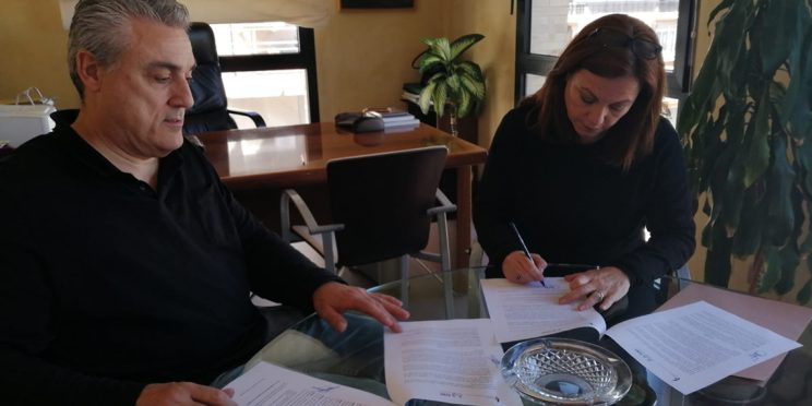 Fotografía firma Convenio COAS