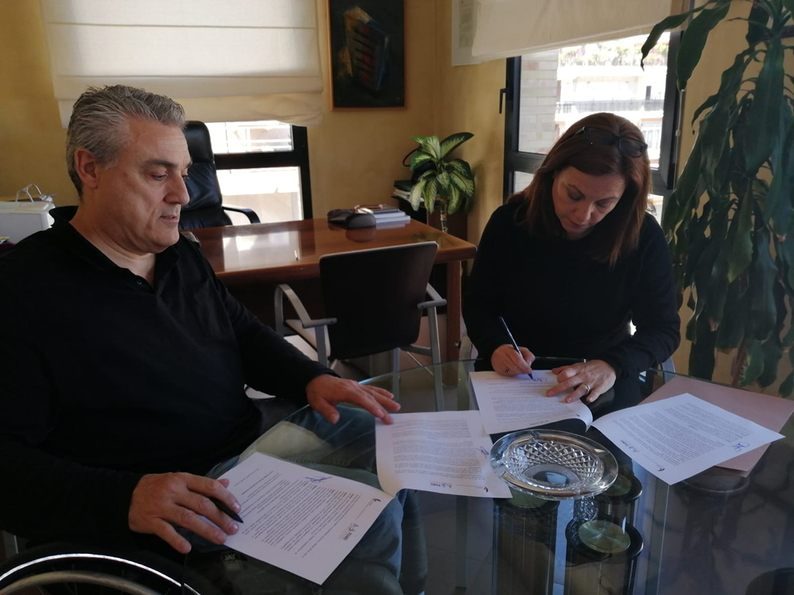 Fotografía firma Convenio COAS